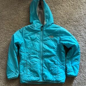 The North Face Blue Puffer Jacket with Quilted Design